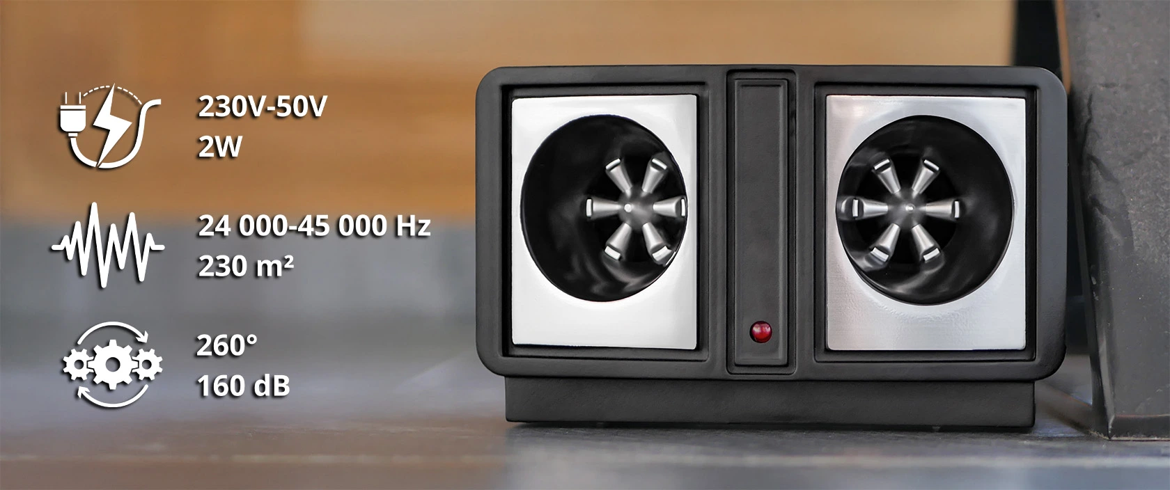 Ultradźwiękowy odstraszacz szkodników z dwoma głośnikami w czarno-srebrnej obudowie; po lewej stronie przedstawione parametry techniczne, m.in. zasięg 230 m² i moc 160 dB.