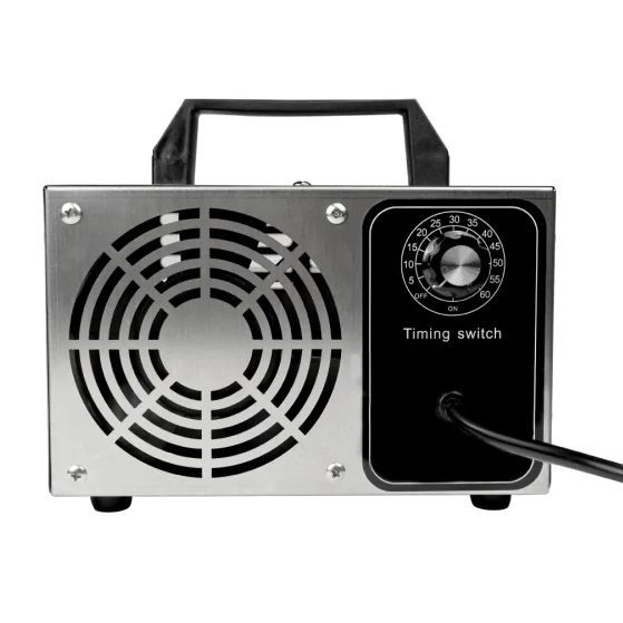 Generator ozonu z uchwytem, metalową obudową, dużym wentylatorem z kratką ochronną oraz pokrętłem czasowym z napisem „Timing switch”.